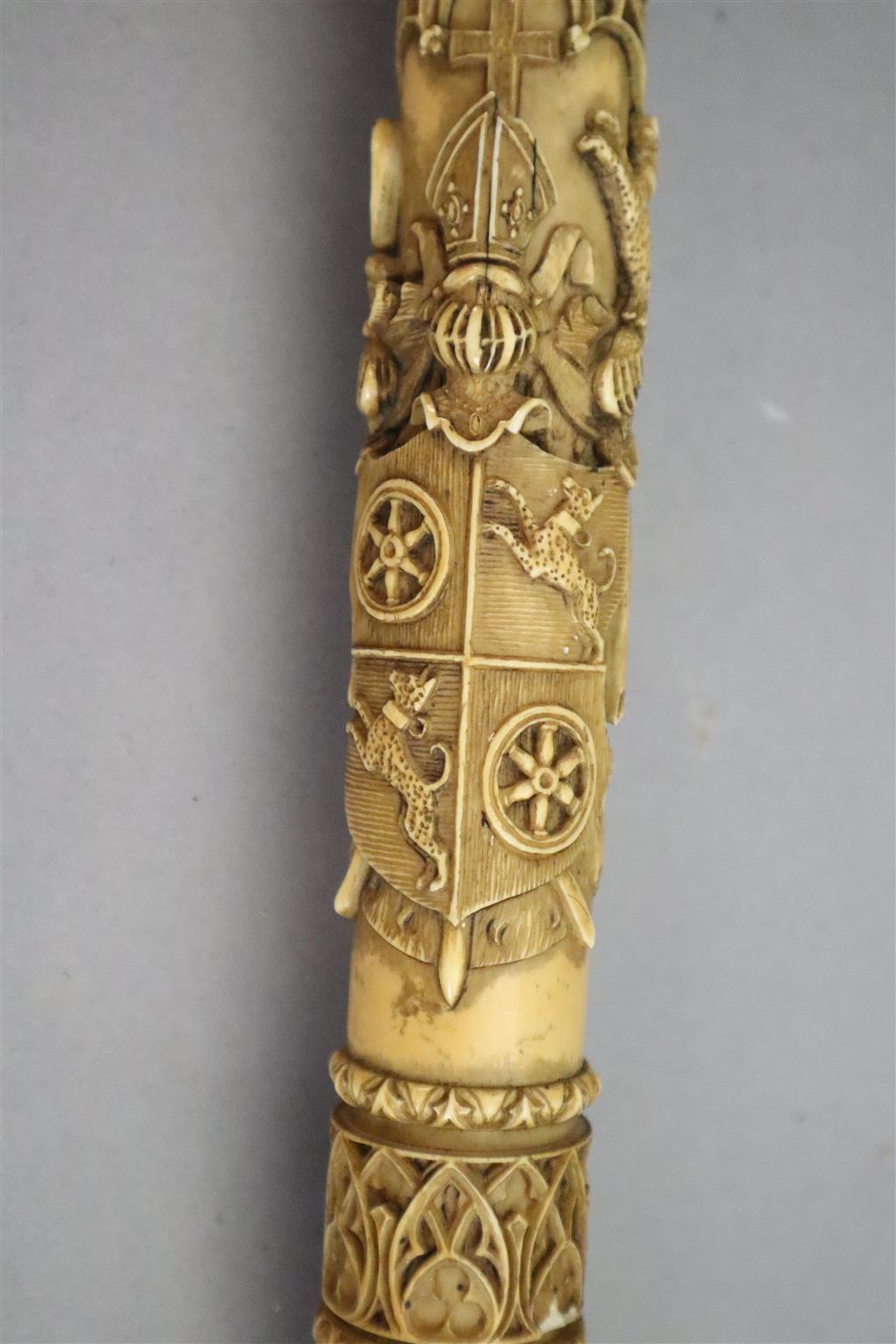 A 19th century Dieppe carved ivory crozier, thought to be a copy of a 13th century example, length 46in.